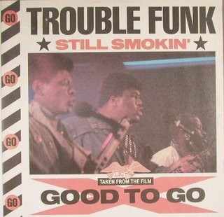 Trouble Funk - Still smokin (Hug A But / The Beat Is Bad) / Its in the mix (Dont touch that stereo) Live in London (12" Vinyl)