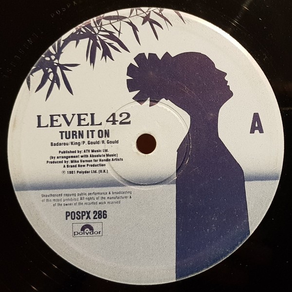 Level 42 - Turn It On (Extended Version) / Beezer One (Unreleased Instrumental) 12" Vinyl