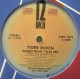 Tiger Moon - Something Tells Me (Club Version / Dub / Radio Edit) Vinyl Promo