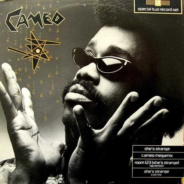 Cameo - She's strange (Long Version / Mark Berry Club mix / Room 123 Rap Version) / Cameo Megamix (Doublepack)